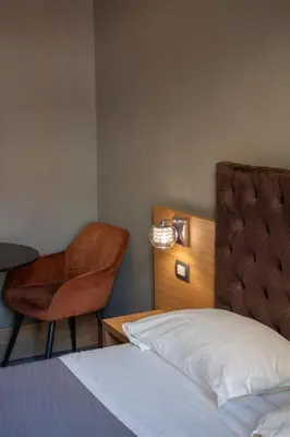 Letto o letti in una camera di BeB Umberto I Napoli