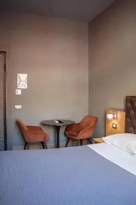Letto o letti in una camera di BeB Umberto I Napoli