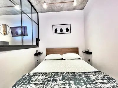 Letto o letti in una camera di Linea1 loft Museo