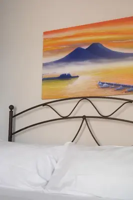 Letto o letti in una camera di EFFE SUITES