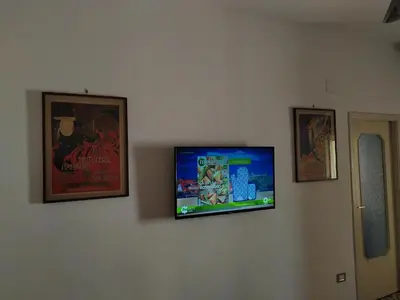TV o dispositivi per l'intrattenimento presso Casa vacanze Maison Zio Bruno A' Scalinatella