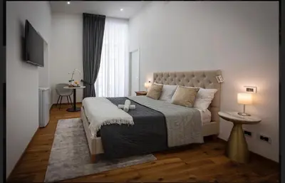 Letto o letti in una camera di Downtown Napoli b&b - e si nun canto moro