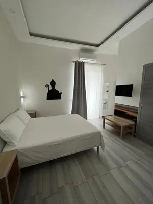 Letto o letti in una camera di A Casa di Gemma