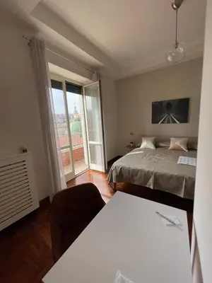 Letto o letti in una camera di LE STANZE DI PARTENOPE
