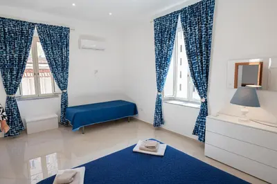 Letto o letti in una camera di Appartament Terra mia