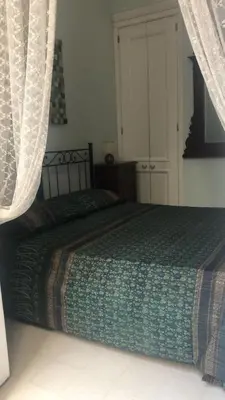 Letto o letti in una camera di La stanza di Zeza