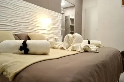 Letto o letti in una camera di Appartamento I Cenni di Napoli