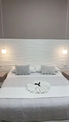 Letto o letti in una camera di Appartamento I Cenni di Napoli