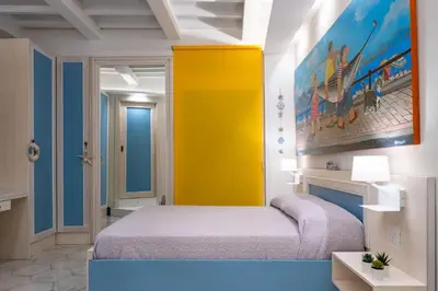 Letto o letti in una camera di Clicka&Sleep Caracciolo