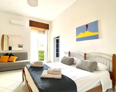 Letto o letti in una camera di Casa Luisa