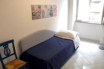Letto o letti in una camera di Casa Luisa