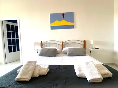 Letto o letti in una camera di Casa Luisa