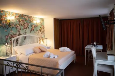Letto o letti in una camera di Bed Boutique Napoli Colors