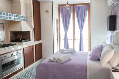 Letto o letti in una camera di Bed Boutique Napoli Colors