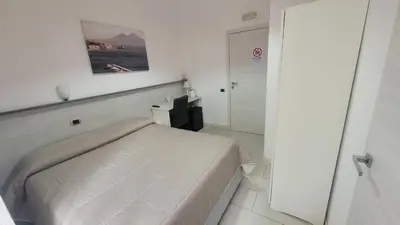 Letto o letti in una camera di B&B Solimena