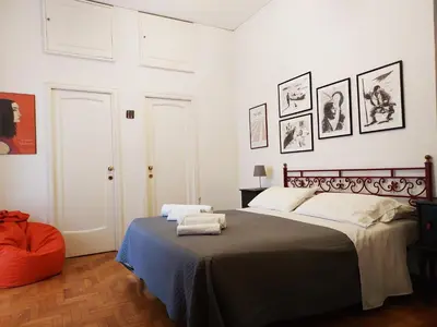 Letto o letti in una camera di Bella Napoli Art Gallery