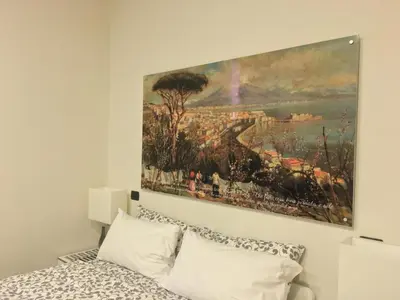 Letto o letti in una camera di BnB Naples