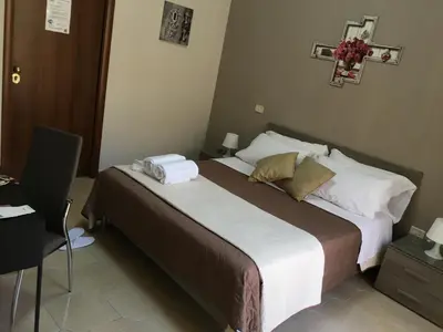 Letto o letti in una camera di Soggiorno Paradiso