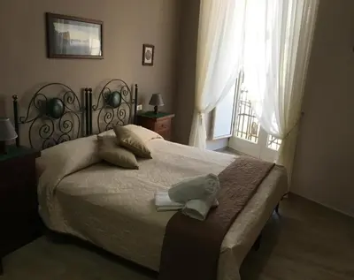 Letto o letti in una camera di Soggiorno Paradiso