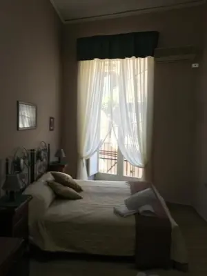 Letto o letti in una camera di Soggiorno Paradiso