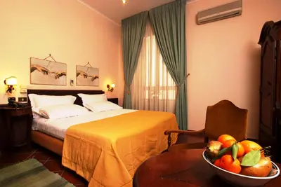 Letto o letti in una camera di Hotel Toledo