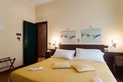 Letto o letti in una camera di Hotel Toledo
