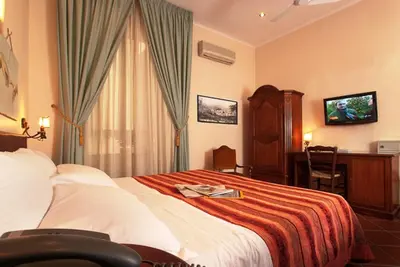 Letto o letti in una camera di Hotel Toledo