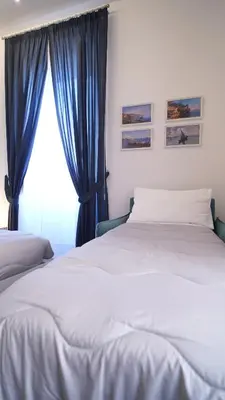 Letto o letti in una camera di A Un Passo Da Tutto...