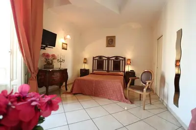Letto o letti in una camera di Bovio Suite