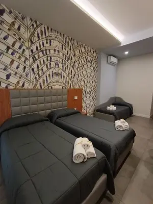 Letto o letti in una camera di Schilizzi Hotel