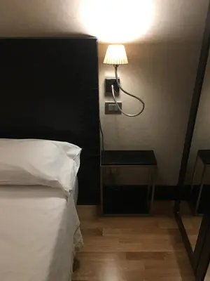 Letto o letti in una camera di MH Design Hotel