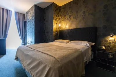 Letto o letti in una camera di MH Design Hotel