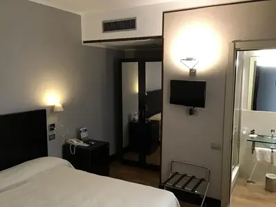 Letto o letti in una camera di MH Design Hotel