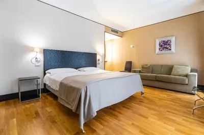 Letto o letti in una camera di MH Design Hotel