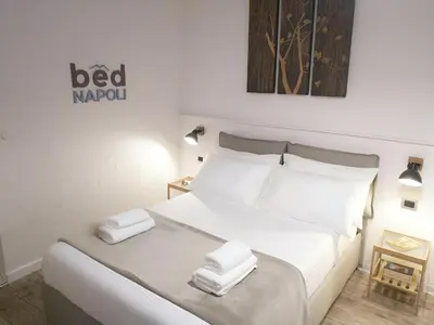 Letto o letti in una camera di Bed Napoli
