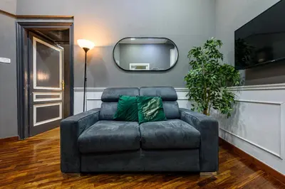 Area soggiorno di DUOMO Luxury Apartment in City Center