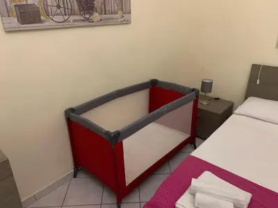 Letto o letti in una camera di Centro storico Napoli La casa di Ciro