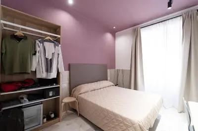 Letto o letti in una camera di P.C. Boutique Medina H. Napoli Centro, by Clapa Group