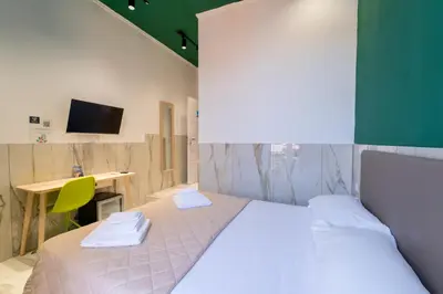 Letto o letti in una camera di P.C. Boutique Medina H. Napoli Centro, by Clapa Group