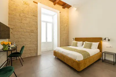 Letto o letti in una camera di Pignasuite