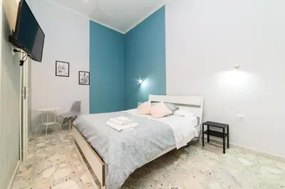 Letto o letti in una camera di Sofia Rooms