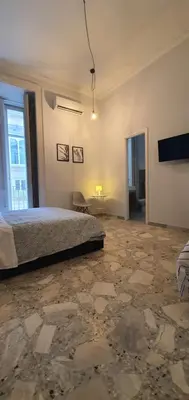 Letto o letti in una camera di Sofia Rooms