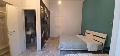 Letto o letti in una camera di Sofia Rooms
