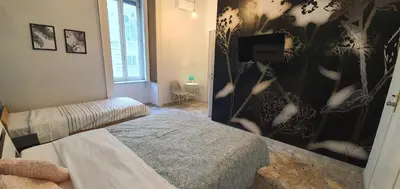 Letto o letti in una camera di Sofia Rooms