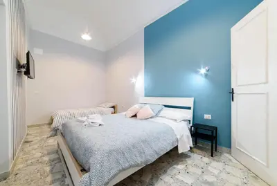 Letto o letti in una camera di Sofia Rooms