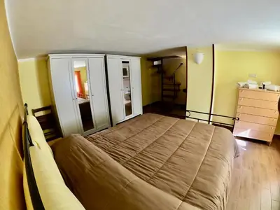 Letto o letti in una camera di Di Sarno's Port'Alba