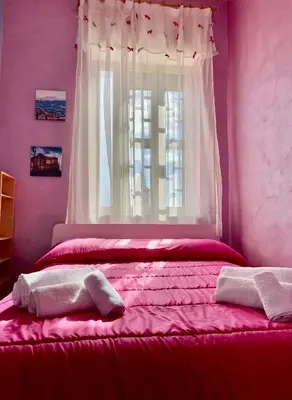 Letto o letti in una camera di Di Sarno's Port'Alba