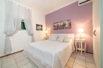 Letto o letti in una camera di Una terrazza sul golfo