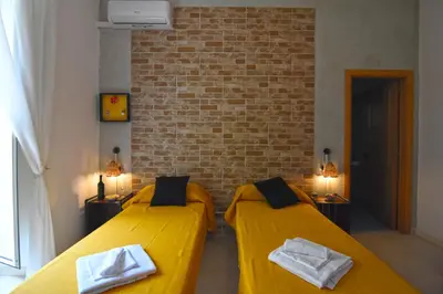 Letto o letti in una camera di Napoli Cityscape