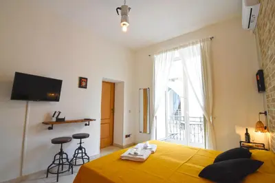Letto o letti in una camera di Napoli Cityscape